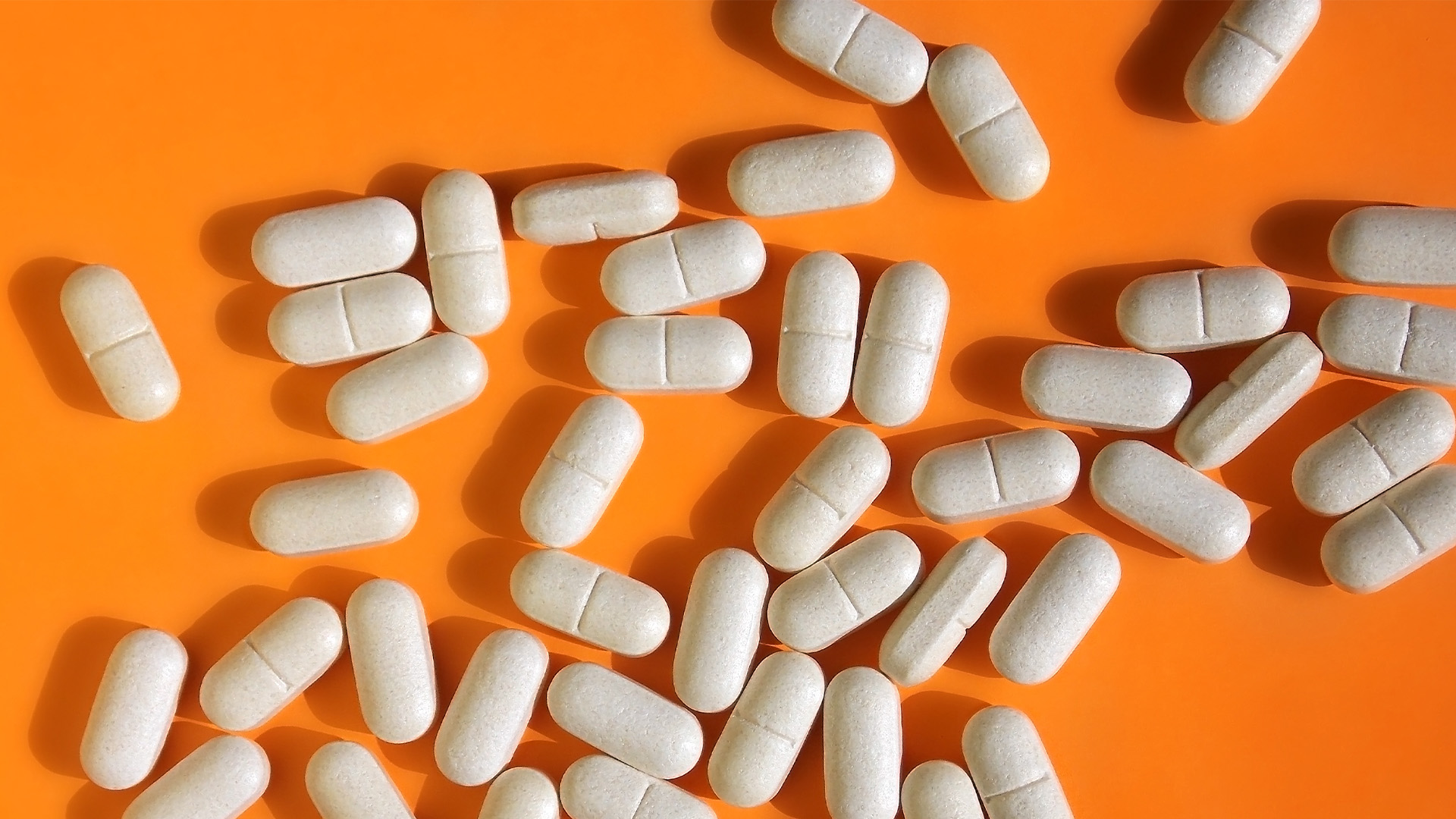 Pile of pills spilled on the table